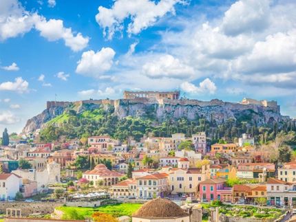 The Neighborhood of Plaka with the Acropolis on the Background