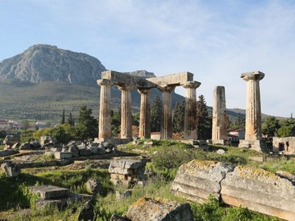 The Remains of the Temple of Apollo and mount Acrocorinth on the Background